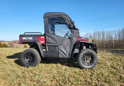 3 Star full cab enclosure on a red Hisun Sector 450, driver side profile with doors zipped and clear windows