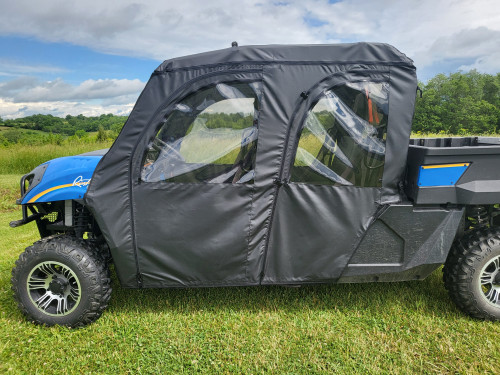 3 Star soft doors with clear windows on a blue New Holland 850 Crew, driver side profile on grass