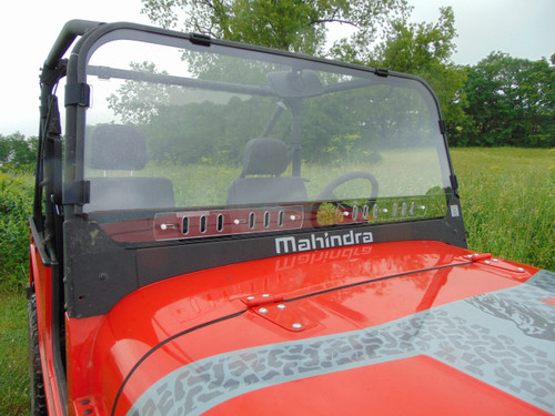 3 Star 1-piece scratch-resistant windshield with vent slots mounted on a red Mahindra Roxor, front view