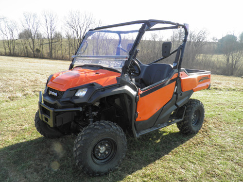 3 Star 2-piece general-purpose windshield on an orange Honda Pioneer 1000, front three-quarter view in a field