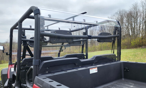 3 Star clear Lexan back panel behind the rear seats of a HiSun Sector 1000 Crew, seen from the cargo bed