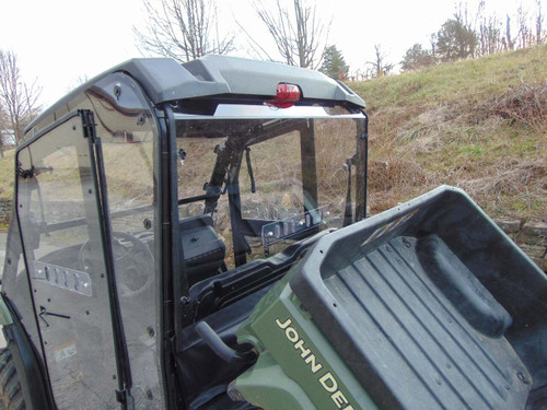 3 Star 1-piece Lexan back panel behind the cab of a John Deere Gator 550 4-seater, seen from the cargo bed