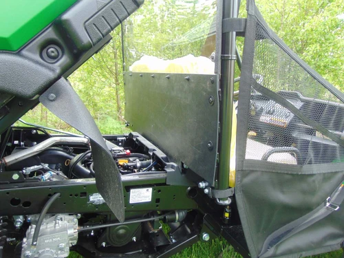 3 Star Lexan back panel with ABS lower panel on a green John Deere Gator seen from the side with the bed tilted up