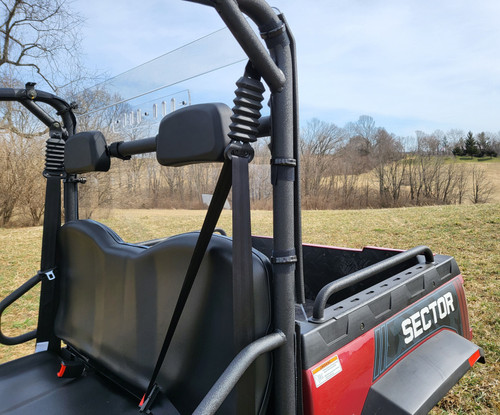 3 Star 1-piece Lexan back panel installed behind the seat of a red HiSun Sector 450, cage-mounted
