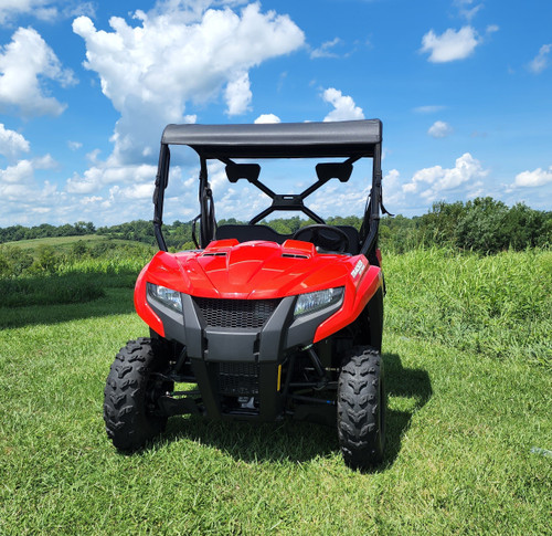 3 Star black soft top on a red Tracker Off Road 500S, head-on view parked in a grassy field