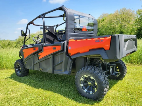 3 Star soft back panel installed behind the rear seats of an orange Intimidator GC1K 6-seater, rear three-quarter view