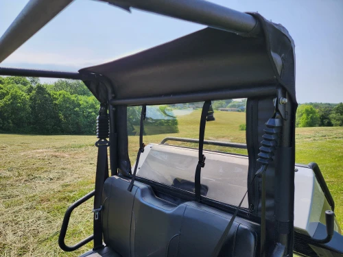 3 Star soft back panel with clear window behind the bench seat of a HiSun Sector 250, inside view under the roof