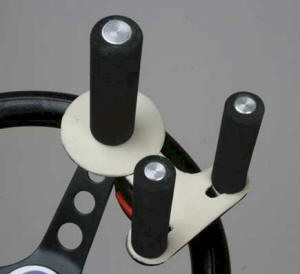 Sure Grip tri-pin grip with clamp-on steering wheel base