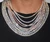 Moissanite tennis necklace worn on neck, shown in 18K white and yellow gold finish