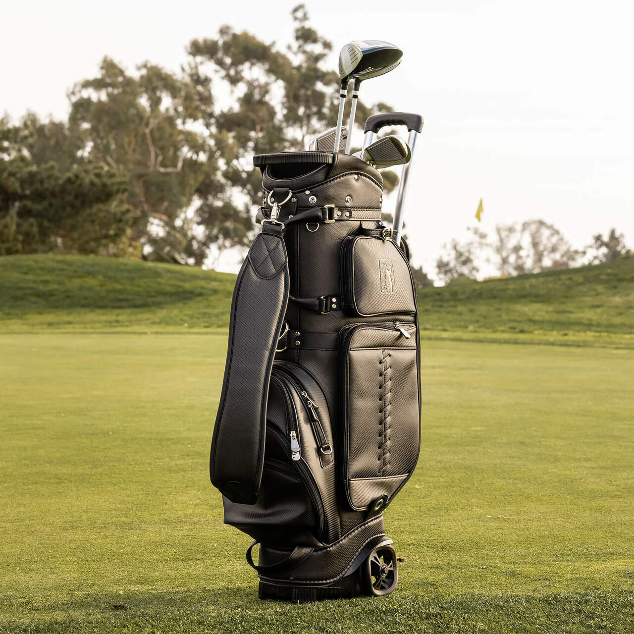 OFFICIAL PGA Tour Branded Golf Bag with Shark Wheels (Black Vegan Leather)