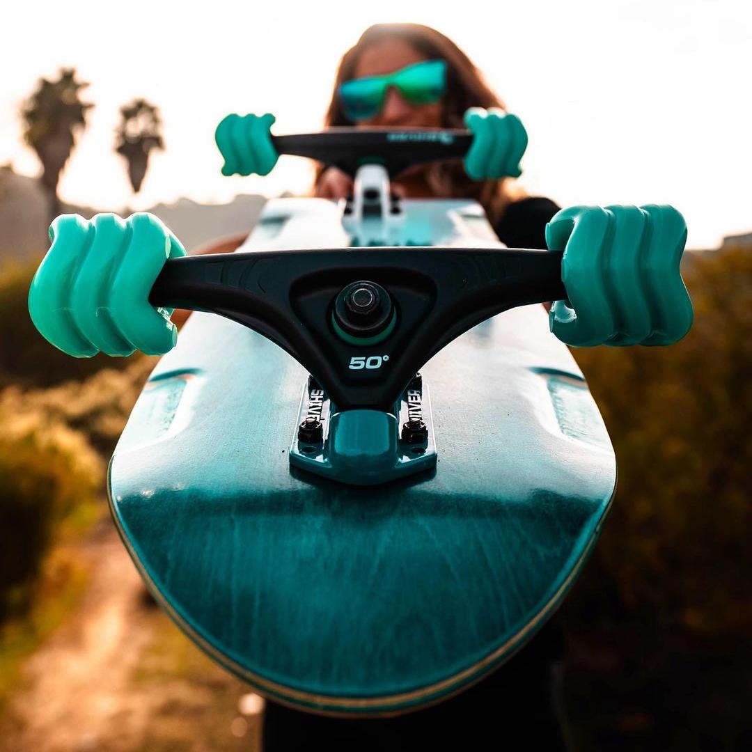 Shark Wheel California Roll skateboard wheels in outdoor lifestyle setting
