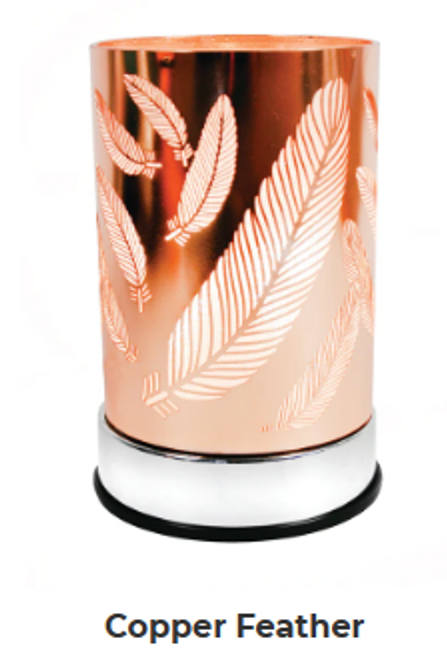 Copper Feather Warmer casts a shimmery glow through a chic, copper metal feather design. A gorgeous addition to any decor!

Features:

- Replacement halogen bulb!
- Made of durable metal.
- Glass cup to safely hold your fragrance.
- Size: 4 in diameter x 6.5 in height

Scentchips® Touch Warmers feature a quick-warming bulb while adjustable settings allow you to control the amount of fragrance for your space! Eliminates flame, providing a safe heat source to melt your Scentchips® while creating a soft glow and tranquil ambiance.


Just plug in, select your desired brightness by touching the base, and enjoy your fabulous Scentchips® fragrance within minutes!