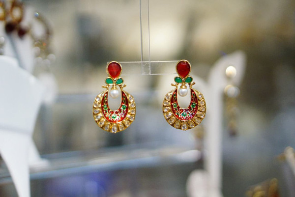 Gold erring with red and green minakari