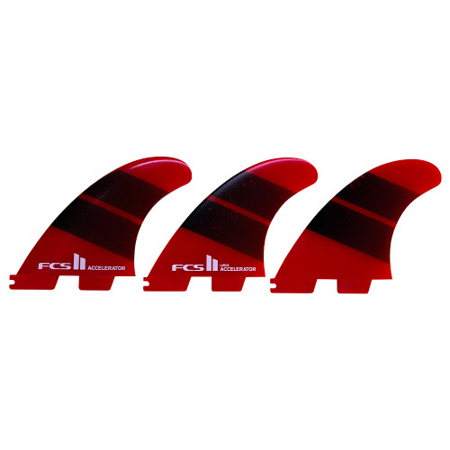 FCS II Accelerator used thruster fin set in orange size large designed for speed control and responsive performance surfing