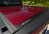 UnderCover 11-17 Dodge Ram 76.8in Fusion Bed Cover - Deep Cherry Red - AR32004L-PRP Photo - Mounted