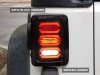 Raxiom 07-18 Jeep Wrangler JK LED Tail Lights- Black Housing (Smoked Lens) - J106751 Photo - Close Up