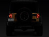 Raxiom 07-18 Jeep Wrangler JK Axial Series Trident LED Tail Lights- Blk Housing (Smoked Lens) - J173718 Photo - Close Up