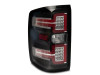 Raxiom 14-18 Chevrolet Silverado 1500 LED Taillights w/ SEQL Turn Signals- Blk Housing (Clear Lens) - S114457 Photo - Close Up