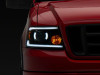 Raxiom 04-08 Ford F-150 Axial Series Projector Headlights w/ SEQL LED Bar- Blk Housing (Clear Lens) - T566364 Photo - Close Up