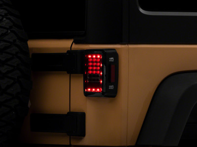 Raxiom 07-18 Jeep Wrangler JK Axial Series LED Tail Lights- Blk Housing (Clear Lens) - J141585 Photo - Primary