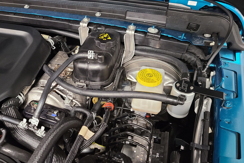 J&amp;L 20-22 Jeep Wrangler 2.0L (Excl Hybrid Models) Driver Side Oil Separator 3.0 - Clear Anodized - 3070D-C