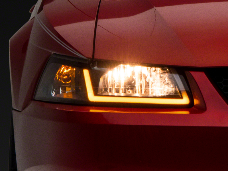 Raxiom 99-04 Ford Mustang Axial Series Headlights w/ Sequential LED Bar- Blk Housing (Clear Lens) - 422713