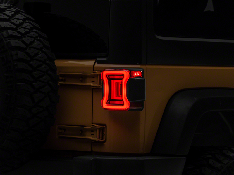 Raxiom 07-18 Jeep Wrangler JK Axial Series JL Style LED Tail Lights- BlkHousing- Red Lens - J164242