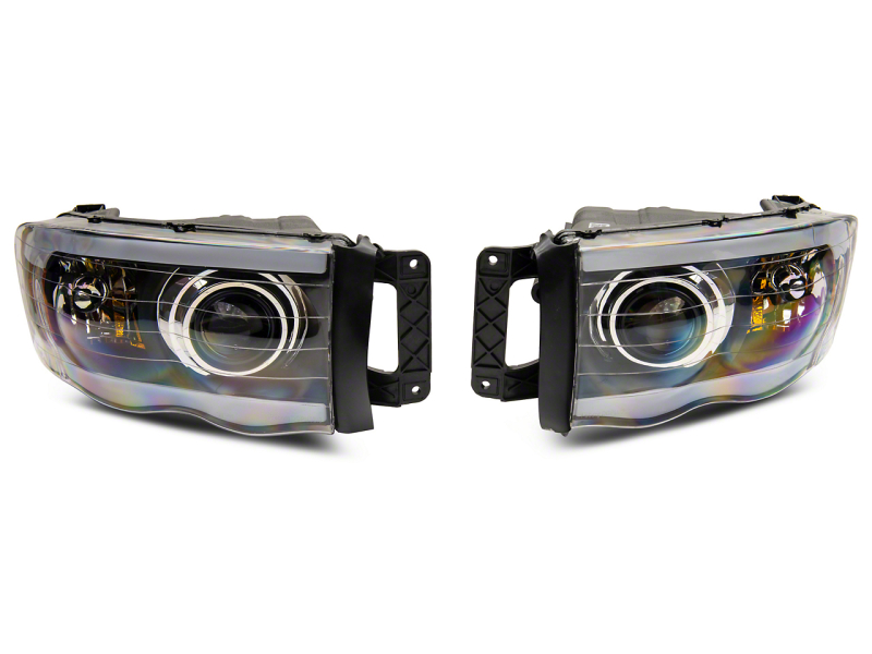 Raxiom 02-05 Dodge RAM 1500 LED Projector Headlights w/ SEQL LED Bar- Blk Housing (Clear Lens) - R131478
