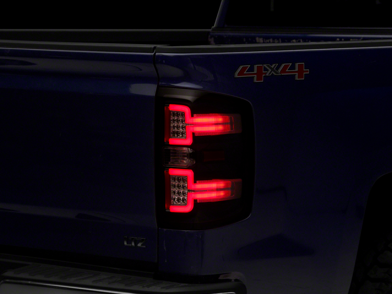 Raxiom 14-18 Chevrolet Silverado 1500 LED Taillights w/ SEQL Turn Signals- Blk Housing (Clear Lens) - S114457