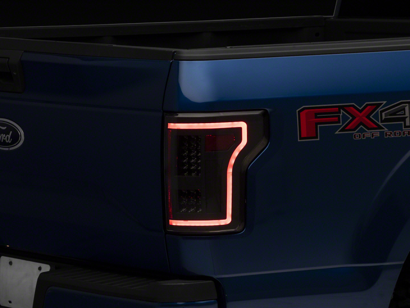 Raxiom 15-17 Ford F-150 LED Tail Lights w/ SEQL Turn Signals- Blk Housing (Clear Lens) - T544625