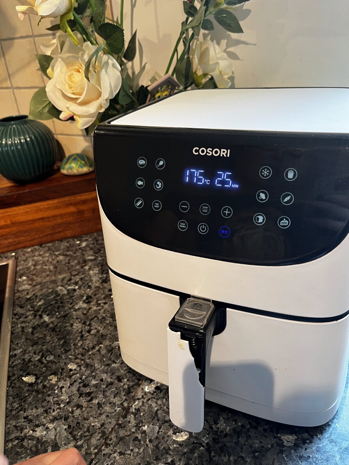 Air fryer display showing the temperature mid-bake