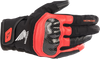 Alpinestars Honda SMX Z Drystar black and bright red motorcycle gloves in Small showing waterproof construction and protective knuckle design