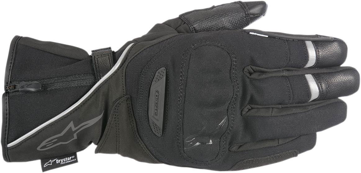 Alpinestars Primer Drystar waterproof cold-weather motorcycle gloves in Black and White, Medium size, featuring long cuff, knuckle armor, and touchscreen fingertips.