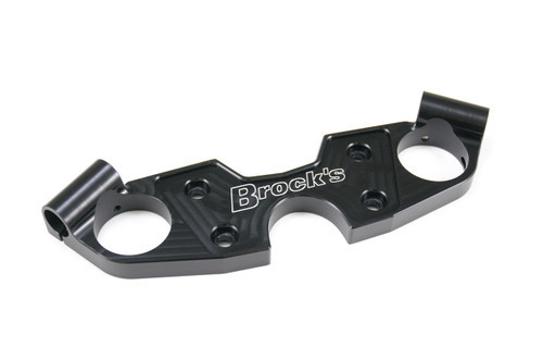 <ul>
<li>A safe and easy way to lower the front of your bike</li>
<li>Raise your fork tubes up to 3/4" above the top clamp</li>
<li>CNC billet aluminum construction</li>
<li>Engraved with Brock's Performance logo</li>
<li>Black anodized finish</li>
<li>Weight: 1.35 lb. (0.61 kg)</li>
</ul>
<p><strong> Important:</strong> This product has been redesigned to eliminate past clearance issues between the OEM brake/clutch lever and the front fairing. May not be compatible with aftermarket levers. Caution should be used when turning the handlebars to the full lock position with aftermarket levers installed; contact between the fairing and levers can engage the front brakes.</p>