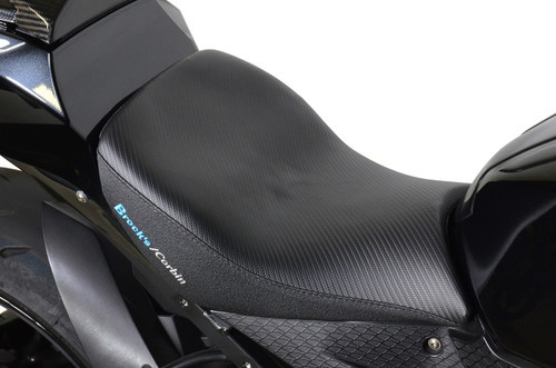 <ul>
<li>Direct replacement for the OEM pilot saddle</li>
<li>Exclusively made for Brock&rsquo;s Performance by Corbin</li>
<li>Custom stepped saddle lowers seat height 0.625" (15.9mm) vs. OEM</li>
<li>Allows the vertically challenged to achieve more positive ground contact</li>
<li>Positive ground contact provides increased rider confidence, comfort, and control</li>
<li>Comfort Cell&reg; foam provides essential comfort and support</li>
<li>Fibertech&trade; basepan for enhanced fit</li>
<li><strong>Side panel material:</strong> Asphalt Vinyl<br /> <em>(An interesting rough texture that gives good traction and visually a nice contrast)</em></li>
<li><strong>Seat area material:</strong> Carbon Fiber Vinyl Black<br /> <em>(An embossed vinyl material that looks like carbon fiber)</em></li>
<li>Rides on rubber bumpers to protect the motorcycle's paint job</li>
<li>Embroidered Brock&rsquo;s Performance and Corbin logos (both sides)</li>
<li>Saddle comes ready to install with pre mounted brackets</li>
<li>Hardware and installation instructions included</li>
<li>Corbin seat weight: 3.90 lb. (1.77 kg)</li>
<li>Lifetime warranty on basepan, hardware and foam</li>
<li><a style="color: blue;" href="%%GLOBAL_ShopPathSSL%%/content/Instructions/S1000RR/998028.pdf" target="_blank">Click to view saddle installation information</a></li>
</ul>
<div class="moretab" data-title="Product Details">
<p>Brock&rsquo;s Performance pilot saddle allows the vertically challenged to achieve positive ground contact. With more ground contact the rider will feel increased confidence, comfort, and control. Built with Corbin's Comfort Cell&reg; foam to provide countless miles of supportive comfort, the exclusive foam material feels firm at first, but doesn't break down like the stock foam. This keeps your body supported indefinitely for day long riding enjoyment.</p>
<p>Engineered to fit perfect to the tank, chassis and tail section. The saddle is manufactured with a Fibertech&trade; basepan for enhanced fit that rides on rubber bumpers to protect the motorcycle's paint job. To make installation easier, the saddle comes ready to install with pre mounted brackets.</p>
<p><strong>Care Notes:</strong> Vinyl is an extremely durable and weather-resistant product and therefore requires little care. It is suggested to avoid any cleaners and/or conditioners that are petroleum-based as they could lead to fading and eventual breakdown of the material. Cleaning can be achieved with <a style="color: blue;" href="https://www.corbin.com/accessories/conditioner.shtml" target="_blank">Corbin&rsquo;s Saddle Cream</a> or a similar product.</p>
<p><em><strong>Note:</strong> The Comfort Cell&reg; foam has a memory feature. It will take approximately 1500-2000 miles for the saddle to shape to the rider.</em></p>
</div>
<div class="moretab" data-title="Technical">
<ul>
<li><strong>PATENTED MANUFACTURING TECHNOLOGY:</strong> The design and manufacture of Corbin products is so unique that Mike Corbin himself holds more than 60 United States Patents! From the manufacturing process itself to the latest engineered materials, you can count on highly functional and unique products that work. Always an innovator, Mike Corbin invented Integrated Molding technology, which is now the process by which all Corbin saddles are made. This process allows extremely tight tolerances and creates a chemical bond between the foam and base material.</li>
</ul>
<ul>
<li><strong>FIBERTECH&trade; BASEPAN:</strong> A purpose built, hybrid material that provides a firm foundation to support the carefully designed ergonomics of the Corbin saddle. It provides a precision fit to every arc and contour of the machine and rides on rubber bumpers to protect your paint.</li>
</ul>
<ul>
<li><strong>COMFORT CELL&reg; FOAM:</strong> The heart of the Brock&rsquo;s Performance saddle by Corbin is the exclusive, purpose-built foam material, called Comfort Cell. The foam was created to provide a firm, resilient ride that doesn't break down during those long days on the road. Continued use of the saddle will allow the foam to contour to your body for ultimate comfort and support.</li>
</ul>
<ul>
<li><strong>ERGONOMIC SHAPING:</strong> A major part of the design criteria of the Brock&rsquo;s Performance saddle by Corbin is the ergonomic shape. This means the saddle's foam shape is designed to emulate the curves of the human body. This provides more square inches of body contact and helps to eliminate hot spots. This shaping also neutralizes the seating platform to help curb sliding in the saddle, which reduces rider fatigue.</li>
</ul>
</div>
<div class="moretab" data-title="Warranty">
<p><strong>SADDLE WARRANTY:</strong> Basepan, foam and hardware of the Corbin saddle is warranted to the original owner for life. Cover materials and workmanship are warranted for one year. Product will only be authorized to be shipped back, freight pre-paid, for refining of shape or to replace/rectify defective parts. In cases where the rework requires a new cover, a recover charge will be applied.</p>
<p><strong>FIBERGLASS WARRANTY:</strong> Structural integrity of Corbin fiberglass components are warranted to the original owner for life. Finish and paint are warranted against manufacturing defects for one year. Damage to the product and/or painted surfaces from outside forces or misuse is specifically not covered under warranty.</p>
</div>