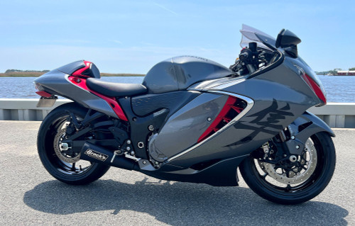 <ul>
<li>Specifically engineered for the Gen 3 (22-26) Suzuki Hayabusa</li>
<li>Modified front section developed to complement the power delivery of the Gen 3</li>
<li>Gen 2 to Gen 3 Hayabusa Full Exhaust Adapter Kit <strong>NOT Required</strong></li>
<li>14" megaphone muffler with black ceramic coated finish</li>
<li>Maximized power gains on stock and modified engines</li>
<li>Combine with a <a style="color: blue;" href="%%GLOBAL_ShopPathSSL%%/dynojet-power-commander-6-hayabusa-22-23/" target="_blank">Dynojet PC6</a> and Brock's Performance 'Street-Style' Map for optimal performance</li>
<li>2.25" outlet permanent baffle</li>
<li>Larger diameter outlet provides increased exhaust flow</li>
<li>High flow head pipe flange kit</li>
<li>Distinctive look/aggressive sound (2.25&rdquo; optional <a style="color: blue;" href="%%GLOBAL_ShopPathSSL%%/noise-suppressor-black-fits-2-25-inch-outlet/" target="_blank">noise suppressor</a> sold separately)</li>
<li>No fairing modifications required</li>
<li>Aerospace quality, ultra lightweight stainless construction</li>
<li>Incredible 77% weight savings vs. OEM exhaust system</li>
<li>Two 12mm O2 bungs pre-installed to accommodate OEM oxygen sensors</li>
<li>One 18mm O2 bung pre-installed to accommodate wideband O2 sensor (block off plug included)</li>
<li>3oz. tube of <a style="color: blue;" href="%%GLOBAL_ShopPathSSL%%/permatex-ultra-copper-3oz/" target="_blank">Permatex Ultra Copper&reg;</a> supplied with purchase</li>
<li>Includes (emissions/PAIR) block off cap and instructions for decel-pop reduction</li>
<li>Includes (4x) replacement graphite exhaust gaskets</li>
<li>Includes Brock&rsquo;s lifetime direct support package <em>at no additional charge</em></li>
<li><a style="color: blue;" href="%%GLOBAL_ShopPathSSL%%/product_images/uploaded_images/Logo_Plates_Article_Page_Display.jpg" target="_blank">Click here to view logo plate color options</a></li>
<li><a style="color: blue;" href="%%GLOBAL_ShopPathSSL%%/content/Instructions/OTHER/998140.pdf" target="_blank">Click here to view installation instructions</a></li>
<li><a style="color: blue;" href="%%GLOBAL_ShopPathSSL%%/content/Instructions/Hayabusa/992131.pdf" target="_blank">Click here to view PAIR block-off instructions</a></li>
</ul>
<p><strong>Recommended: </strong>Upgraded exhaust header bolts <a style="color: blue;" href="%%GLOBAL_ShopPathSSL%%/exhaust-header-bolt-upgrade-kit-hayabusa-99-24-gsx-r1000-01-24-zx-14-r-06-24-and-zx-10r-04-24/" target="_blank">available here</a> (a solution to the known issue of <a style="color: blue;" href="%%GLOBAL_ShopPathSSL%%/content/images/834379_Exhaust_Header_Bolt_Upgrade_Kit_Examples_Zoom.jpg" target="_blank">bent OEM hardware</a>).</p>
<div class="moretab" data-title="Product Details">
<p><strong>The Follow-Up To Our Best-Selling Exhaust System</strong></p>
<p>The Alien Head 2&trade; offers a full through 2.25&rdquo; diameter secondary section and bigger flange kit to take full advantage of state-of-the-art high performance aftermarket cylinder head porting techniques. These free-flow exhaust enhancements allow the performance curve to be moved up, via aftermarket ECU modifications when using a stock displacement engine, while also allowing larger displacement engines to breath freely &ndash; a must for the loyal Hayabusa owner who&rsquo;s serious about competing against today&rsquo;s alternate brands of modern sportbikes.</p>
<p>The Alien Head 2&trade; exhaust system combines our legendary, race-proven performance with the distinctive look and deeper tone than the original Alien Head&trade; muffler, which has become a favorite with custom builders to showcase more of today&rsquo;s big tire/custom swingarms. Manufactured to stringent specifications, Brock personally designed and hand-tuned the Alien Head 2&trade; full exhaust system to find the ideal balance of performance and attitude for the stock to highly modified Hayabusa.</p>
<p>The Alien Head 2&trade; exhaust system stands as the benchmark of cutting edge power, design, and style.</p>
</div>
<div class="moretab" data-title="Technical">
<p><strong>Dyno Chart:</strong> Click image to enlarge</p>
<p><em>SAE Scale</em></p>
<p><a href="%%GLOBAL_ShopPathSSL%%/product_images/uploaded_images/22_Hayabusa_Gen_3_Specific_Penta_Carbon_vs_Stock.jpg" target="_blank"><img src="https://cdn11.bigcommerce.com/s-415rnuyx4g/product_images/uploaded_images/22_Hayabusa_Gen_3_Specific_Penta_Carbon_vs_Stock_Th.jpg" alt="" /></a></p>
<hr style="width: 50%;" />
<p><strong>Hayabusa (2022) Exhaust Weight Comparison</strong></p>
<p><em><strong>OEM Full Exhaust System:</strong></em></p>
<ul>
<li>Mufflers w/ Clamps: 23.90 lb.</li>
<li>Front Section (one piece): 17.55 lb.<br /> (head pipes, catalytic converter, EXUP, tail pipe, etc.)</li>
<li>Heatshields and Hardware: 1.95 lb.</li>
</ul>
<p><em>Total =</em> 43.40 lb.</p>
<p><em><strong>Alien Head 2&trade; Full System:</strong></em></p>
<ul>
<li>Muffler: 3.05 lb.</li>
<li>Head Pipes (w/ flanges): 5.20 lb.</li>
<li>Collector: 1.50 lb.</li>
<li>Hardware: 0.40 lb.</li>
</ul>
<p><em>Total =</em> 10.15 lb.</p>
<p><strong>Total Weight Savings = </strong> 33.25 lb. or 77% of OEM weight</p>
</div>