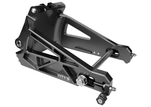 <ul>
<li>Black anodized performance swingarm</li>
<li>CNC machined from billet aluminum</li>
<li>Designed for stability and control while shedding&nbsp;10% of the OEM arm weight</li>
<li>Compatible with (18-26) Softail models</li>
<li>Includes an upgraded 25mm axle and bearings</li>
<li><strong>Applications utilizing a lowered rear suspension setup require custom machining of the drive belt slot</strong></li>
<li><strong>OEM axial mounted calipers do not fit</strong></li>
<li><strong>108mm radial caliper mount included for aftermarket caliper installation</strong></li>
<li>108mm aftermarket radial calipers available <a style="color: blue;" href="%%GLOBAL_ShopPathSSL%%/v-twin/brakes/brake-calipers/caliper-singles/" target="_blank">here</a></li>
<li><a style="color: blue;" href="%%GLOBAL_ShopPathSSL%%/content/Bitubo/Instructions/Vitys_Design_Softail_Swingarm_Assembly_Diagram_Revised.pdf" target="_blank">Click here to view swingarm schematic and torque specs</a></li>
</ul>
<p><em>Installation should be performed following the OEM Harley-Davidson Service Manual and torque specifications</em></p>
<div class="moretab" data-title="About Vity's Design">
<p>Vity's goal is to dedicate the highest effort we possibly can into our original, custom designed products for your beloved Harley Davidson. Quality and customer satisfaction is imperative to us. We also love our heritage that helped us greatly in the process of creating this brand. Italian craftsmanship at its best.</p>
<p>Vity&rsquo;s Design showcases the natural beauty of CNC machining in most products by intentionally omitting final finishing processes such as tumbling, stonewashing, burnishing, or polishing.</p>
<p>The following quote from Vity's Design Founder, Matteo Vitali is translated from Italian: "From the incredible passion for Harley Davidson, my every single iron take shape. From a deep and meticulous study of materials, shapes and color, my accessories come to life."</p>
</div>