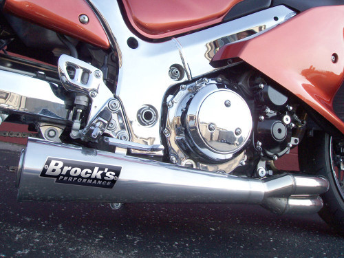 <ul> <li>20" megaphone muffler</li> <li>Show-polished finish</li> <li>2.25&rdquo; outlet removable baffle</li> <li>Pro Stock performance, look, and sound with removable baffle<br />(optional 2.25" noise reduction insert sold separately)</li> <li>Aerospace quality, ultra light-weight stainless construction</li> <li>Limited right hand cornering clearance with fairing modifications required on most models, cut-out instructions included</li> <li>Includes (Emissions/PAIR) Block Off Cap and instructions for decel-pop reduction</li> <li>May be used with OEM oil pan; aftermarket billet pan suggested for maximum ground clearance</li> <li>Oil cooler can be retained using the stock oil lines</li> <li>3oz. tube of <a style="color: blue;" href="%%GLOBAL_ShopPathSSL%%/permatex-ultra-copper-3oz/" target="_blank">Permatex Ultra Copper&reg;</a> supplied with purchase</li> <li>Includes Brock's lifetime direct support package <br /> <em>At no additional charge</em></li> <li>Select from increased drivability/fuel mileage (pump gas) or race-proven (race fuel) track maps via our map support program <br /> <em>At no additional charge</em></li> <li><a style="color: blue;" href="%%GLOBAL_ShopPathSSL%%/product_images/uploaded_images/Logo_Plates_Article_Page_Display.jpg" target="_blank">Click here to view logo plate color options</a></li> <li><a style="color: blue;" href="%%GLOBAL_ShopPathSSL%%/content/Instructions/OTHER/992027.pdf" target="_blank">Click here for bodywork cutting instructions</a></li> <li><a style="color: blue;" href="%%GLOBAL_ShopPathSSL%%/product_images/uploaded_images/Sidewinder_Length_Comparison.jpg" target="_blank">Click to View Sidewinder Length Comparison (14" vs. 20")</a></li> </ul> <div class="moretab" data-title="Product Details"> <p><strong>Industry&rsquo;s First 4-2-1 Sidewinder Design</strong></p> <p>Specifically designed for use without wheelie bars, Brock&rsquo;s 4-into-2-into-1 sidewinder (the industry&rsquo;s first) provides the most average power and torque with a megaphone-induced peak power punch. Unique configuration allows maximum performance from stock displacement to big cc engines. Years of knowledge, acquired from Brock himself professionally drag racing street bikes, are merged into a purpose-built side exit system.</p> </div>