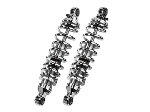 <ul> <li>Significantly increased riding comfort and adjustability</li> <li>Alloyed steel main shock body with chrome finish</li> <li>Springs manufactured from Cr-Si alloyed steel (chrome)</li> <li>Silver anodized CNC machined billet aluminum head</li> <li>Manual spring preload adjustment system (tool included)</li> <li>Nitrogen pressurized coaxial chamber with oil/gas aluminum piston</li> <li>Includes set-up manual, install instructions, and adjustment tool</li> <li>Adjustable features include:</li> <ul> <li>Spring preload (manual)</li> <li>Hydraulic rebound</li> </ul> <li><strong>Note:</strong> Fitment intended for Harley-Davidson Dyna's but compatible with applications using 0.50" DIA shock mounting hardware</li> </ul> <div class="moretab" data-title="Product Details"> <p>If you're lucky enough to live in a place with beautifully paved roads and an unexplained lack of potholes, then shock absorbers aren't a big deal for you. For the rest of us that ride on today&rsquo;s roads, varying levels of shock performance make significant difference in our riding experience. Most OEM motorcycle suspensions are carefully designed to ensure adequate performance under a variety of conditions. Still, every suspension represents numerous compromises, as manufacturers must design their motorcycles for a variety of needs and conditions, while ensuring that some customers&rsquo; expectations about ride and handling are met effectively and safely. But, your needs may not match what the manufacturer had in mind for their particular model.</p> <p>Bitubo presents its WMEo series rear twin shocks in chrome and black, for select Harley-Davidson models. The WMEo shocks allow a remarkable overall improvement over the factory shocks as well as improved handling at higher speed, higher loads, and variable terrain.</p> <p><strong>Technical Features:</strong> These monotube shocks only use a single outer tube. The oil and gas are separated by a free floating piston which puts the oil on the top and Nitrogen gas on the bottom shock body in high resistance alloy steel with a CNC machined billet aluminum head.</p> <ul> <li>The monotube shock design contains a larger active piston surface area, which means greater and more consistent damping force.</li> <li>Lower operating pressure leads to more consistent and controlled rides.</li> <li>Other benefits include increased oil capacity, improved heat dissipation, and longevity.</li> <li>The free-floating piston valve never allows oil and gas to mix thus minimizes foaming. The overall effect is that monotubes offer better and more precise damping.</li> <li>Monotubes are more durable; require minimal maintenance and the cost in the long run is much lower.</li> </ul> </div> <div class="moretab" data-title="About Bitubo"> <p><iframe src="%%GLOBAL_ShopPathSSL%%/content/Descriptions/About_Bitubo_Description_Tab.html" width="100%" height="500" frameborder="0"></iframe></p> </div>