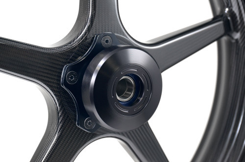 <ul>
<li>Cleans up the look of a front BST wheel when running a single brake rotor</li>
<li>Covers the hub of BST wheels with a 5 x 3.25&rdquo; (82.55mm) PCD (brake mounting bolt circle) and 5/16&rdquo; bolts</li>
<li>Fits all front BST wheels for Sportster, Softail, Dyna, and Touring w/ hub mounted rotors</li>
<li>Machined from billet aluminum</li>
<li>Black powder coated finish</li>
<li>Includes mounting hardware</li>
<li>Designed, machined, and assembled in the USA</li>
<li><a style="color: blue;" href="%%GLOBAL_ShopPathSSL%%/content/Instructions/VTwin/998142.pdf" target="_blank">Click here to view Installation Instructions</a></li>
</ul>