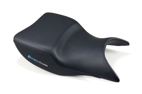 <ul>
<li>Direct replacement for the OEM pilot saddle</li>
<li>Exclusively made for Brock&rsquo;s Performance by Corbin</li>
<li>Custom stepped saddle lowers seat height 1" (25.4mm) vs. OEM</li>
<li>Allows the vertically challenged to achieve more positive ground contact</li>
<li>Positive ground contact provides increased rider confidence, comfort, and control</li>
<li>Comfort Cell&reg; foam provides essential comfort and support</li>
<li>Fibertech&trade; basepan for enhanced fit</li>
<li><strong>Side panel material:</strong> Asphalt Vinyl<br /> <em>(An interesting rough texture that gives good traction and visually a nice contrast)</em></li>
<li><strong>Seat area material:</strong> Carbon Fiber Vinyl Black<br /> <em>(An embossed vinyl material that looks like carbon fiber)</em></li>
<li>Rides on rubber bumpers to protect the motorcycle's paint job</li>
<li>Embroidered Brock&rsquo;s Performance and Corbin logos (both sides)</li>
<li>Saddle comes ready to install with pre mounted brackets</li>
<li>Corbin seat weight: 4.20 lb. (1.90 kg) vs. OEM seat weight: 2.40 lb. (1.09 kg)</li>
<li>Lifetime warranty on basepan, hardware, and foam</li>
<li><a style="color: blue;" href="%%GLOBAL_ShopPathSSL%%/content/Instructions/Hayabusa/install_s-gsx13r-22-f.pdf" target="_blank">Click here to view Installation Instructions</a></li>
</ul>
<div class="moretab" data-title="Product Details">
<p>Brock&rsquo;s Performance pilot saddle allows the vertically challenged to achieve positive ground contact. With more ground contact the rider will feel increased confidence, comfort, and control. Built with Corbin's Comfort Cell&reg; foam to provide countless miles of supportive comfort, the exclusive foam material feels firm at first, but doesn't break down like the stock foam. This keeps your body supported indefinitely for day long riding enjoyment.</p>
<p>Engineered to fit perfect to the tank, chassis and tail section. The saddle is manufactured with a Fibertech&trade; basepan for enhanced fit that rides on rubber bumpers to protect the motorcycle's paint job. To make installation easier, the saddle comes ready to install with pre mounted brackets.</p>
<p><strong>Care Notes:</strong> Vinyl is an extremely durable and weather-resistant product and therefore requires little care. It is suggested to avoid any cleaners and/or conditioners that are petroleum-based as they could lead to fading and eventual breakdown of the material. Cleaning can be achieved with <a style="color: blue;" href="https://www.corbin.com/accessories/conditioner.shtml" target="_blank">Corbin&rsquo;s Saddle Cream</a> or a similar product.</p>
<p><em><strong>Note:</strong> The Comfort Cell&reg; foam has a memory feature. It will take approximately 1500-2000 miles for the saddle to shape to the rider.</em></p>
</div>
<div class="moretab" data-title="Technical">
<ul>
<li><strong>PATENTED MANUFACTURING TECHNOLOGY:</strong> The design and manufacture of Corbin products is so unique that Mike Corbin himself holds more than 60 United States Patents! From the manufacturing process itself to the latest engineered materials, you can count on highly functional and unique products that work. Always an innovator, Mike Corbin invented Integrated Molding technology, which is now the process by which all Corbin saddles are made. This process allows extremely tight tolerances and creates a chemical bond between the foam and base material.</li>
</ul>
<ul>
<li><strong>FIBERTECH&trade; BASEPAN:</strong> A purpose built, hybrid material that provides a firm foundation to support the carefully designed ergonomics of the Corbin saddle. It provides a precision fit to every arc and contour of the machine and rides on rubber bumpers to protect your paint.</li>
</ul>
<ul>
<li><strong>COMFORT CELL&reg; FOAM:</strong> The heart of the Brock&rsquo;s Performance saddle by Corbin is the exclusive, purpose-built foam material, called Comfort Cell. The foam was created to provide a firm, resilient ride that doesn't break down during those long days on the road. Continued use of the saddle will allow the foam to contour to your body for ultimate comfort and support.</li>
</ul>
<ul>
<li><strong>ERGONOMIC SHAPING:</strong> A major part of the design criteria of the Brock&rsquo;s Performance saddle by Corbin is the ergonomic shape. This means the saddle's foam shape is designed to emulate the curves of the human body. This provides more square inches of body contact and helps to eliminate hot spots. This shaping also neutralizes the seating platform to help curb sliding in the saddle, which reduces rider fatigue.</li>
</ul>
</div>
<div class="moretab" data-title="Warranty">
<p><strong>SADDLE WARRANTY:</strong> Basepan, foam and hardware of the Corbin saddle is warranted to the original owner for life. Cover materials and workmanship are warranted for one year. Product will only be authorized to be shipped back, freight pre-paid, for refining of shape or to replace/rectify defective parts. In cases where the rework requires a new cover, a recover charge will be applied.</p>
<p><strong>FIBERGLASS WARRANTY:</strong> Structural integrity of Corbin fiberglass components are warranted to the original owner for life. Finish and paint are warranted against manufacturing defects for one year. Damage to the product and/or painted surfaces from outside forces or misuse is specifically not covered under warranty.</p>
</div>
