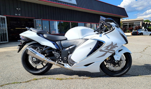 <ul>
<li>Specifically engineered for the Gen 3 (22-26) Suzuki Hayabusa</li>
<li>Gen 2 to Gen 3 Hayabusa Full Exhaust Adapter Kit <strong>NOT Required</strong></li>
<li>Full titanium construction with carbon fiber tip</li>
<li>World class craftsmanship, fit, and finish</li>
<li>Combine with a <a style="color: blue;" href="%%GLOBAL_ShopPathSSL%%/dynojet-power-commander-6-hayabusa-22-23/" target="_blank">Dynojet PC6</a> and Brock's Performance 'Street-Style' Map for optimal performance</li>
<li>Lightweight system weighs only 9.90 lb.</li>
<li>Great for everyday riding <a style="color: blue;" href="%%GLOBAL_ShopPathSSL%%/noise-reduction-plug-for-use-in-all-ct-series-systems/" target="_blank">(noise reduction insert available)</a></li>
<li>Two 12mm O2 bungs pre-installed to accommodate OEM oxygen sensors (block off plugs included)</li>
<li>One 18mm O2 bung pre-installed to accommodate wideband O2 sensor (block off plug included)</li>
<li>Installation hardware and instructions included</li>
<li>Includes (Emissions/PAIR) Block Off Cap and instructions for decel-pop reduction</li>
<li>Includes Brock&rsquo;s lifetime direct support package <em>at no additional charge</em></li>
<li>Select from increased drivability/fuel mileage (pump gas) or race-proven (race fuel) track maps via our <a style="color: blue;" href="https://blog.brocksperformance.com/category/map-support/" target="_blank">map support program</a> <em>at no additional charge</em></li>
<li><a style="color: blue;" href="%%GLOBAL_ShopPathSSL%%/product_images/uploaded_images/Logo_Plates_Article_Page_Display.jpg" target="_blank">Click here to view logo plate color options</a></li>
<li><a style="color: blue;" href="%%GLOBAL_ShopPathSSL%%/content/Instructions/Hayabusa/994081.pdf" target="_blank">Click here to view installation instructions</a></li>
<li><a style="color: blue;" href="%%GLOBAL_ShopPathSSL%%/content/Instructions/Hayabusa/992131.pdf" target="_blank">Click here to view PAIR block-off instructions</a></li>
</ul>
<p><strong>Recommended: </strong>Upgraded exhaust header bolts <a style="color: blue;" href="%%GLOBAL_ShopPathSSL%%/exhaust-header-bolt-upgrade-kit-hayabusa-99-24-gsx-r1000-01-24-zx-14-r-06-24-and-zx-10r-04-24/" target="_blank">available here</a> (a solution to the known issue of <a style="color: blue;" href="%%GLOBAL_ShopPathSSL%%/content/images/834379_Exhaust_Header_Bolt_Upgrade_Kit_Examples_Zoom.jpg" target="_blank">bent OEM hardware</a>).</p>
<div class="moretab" data-title="Product Details">
<p><strong>Brock&rsquo;s &lsquo;best of the best&rsquo; under fairing exhaust system</strong></p>
<p>The Brock&rsquo;s Performance CT Series&trade; full titanium exhaust system is a direct result of incalculable hours of engineering/design work combined with real world performance testing. The entire exhaust system weighs only 9.90 lb. and offers the highest power readings out of any of our under fairing (non-sidewinder) exhaust systems. The CT Series&trade; not only provides superb cornering clearance, but if you are a weekend drag racer, the system also provides unmatched ground clearance. If world class craftsmanship and quality as well as welds that look like &lsquo;art&rsquo; are high on your list, then the Brock&rsquo;s Performance CT Series&trade; full titanium exhaust system is for you.</p>
</div>
<div class="moretab" data-title="Technical">
<p><strong>Hayabusa (2022) Exhaust Weight Comparison</strong></p>
<p><em><strong>OEM Full Exhaust System:</strong></em></p>
<ul>
<li>Mufflers w/ Clamps: 23.90 lb.</li>
<li>Front Section (one piece): 17.55 lb.<br /> (head pipes, catalytic converter, EXUP, tail pipe, etc.)</li>
<li>Heatshields and Hardware: 1.95 lb.</li>
</ul>
<p><em>Total =</em> 43.40 lb.</p>
<p><em><strong>CT Single&trade; Full System:</strong></em></p>
<ul>
<li>Muffler: 3.40 lb.</li>
<li>Head Pipes: 3.20 lb.</li>
<li>Collector: 1.20 lb.</li>
<li>Midpipe: 0.80 lb.</li>
<li>Hardware: 1.30 lb.</li>
</ul>
<p><em>Total =</em> 9.90 lb.</p>
</div>