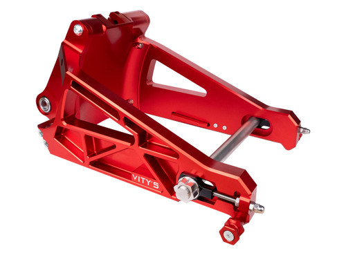 <ul>
<li>Red anodized performance swingarm</li>
<li>CNC machined from billet aluminum</li>
<li>Designed for stability and control while shedding&nbsp;10% of the OEM arm weight</li>
<li>Compatible with (18-26) Softail models</li>
<li>Includes an upgraded 25mm axle and bearings</li>
<li><strong>Applications utilizing a lowered rear suspension setup require custom machining of the drive belt slot</strong></li>
<li><strong>OEM axial mounted calipers do not fit</strong></li>
<li><strong>108mm radial caliper mount included for aftermarket caliper installation</strong></li>
<li>108mm aftermarket radial calipers available <a style="color: blue;" href="%%GLOBAL_ShopPathSSL%%/v-twin/brakes/brake-calipers/caliper-singles/" target="_blank">here</a></li>
<li><a style="color: blue;" href="%%GLOBAL_ShopPathSSL%%/content/Bitubo/Instructions/Vitys_Design_Softail_Swingarm_Assembly_Diagram_Revised.pdf" target="_blank">Click here to view swingarm schematic and torque specs</a></li>
</ul>
<p><em>Installation should be performed following the OEM Harley-Davidson Service Manual and torque specifications</em></p>
<div class="moretab" data-title="About Vity's Design">
<p>Vity's goal is to dedicate the highest effort we possibly can into our original, custom designed products for your beloved Harley Davidson. Quality and customer satisfaction is imperative to us. We also love our heritage that helped us greatly in the process of creating this brand. Italian craftsmanship at its best.</p>
<p>Vity&rsquo;s Design showcases the natural beauty of CNC machining in most products by intentionally omitting final finishing processes such as tumbling, stonewashing, burnishing, or polishing.</p>
<p>The following quote from Vity's Design Founder, Matteo Vitali is translated from Italian: "From the incredible passion for Harley Davidson, my every single iron take shape. From a deep and meticulous study of materials, shapes and color, my accessories come to life."</p>
</div>