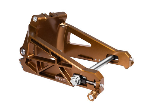 <ul>
<li>Bronze anodized performance swingarm</li>
<li>CNC machined from billet aluminum</li>
<li>Designed for stability and control while shedding&nbsp;10% of the OEM arm weight</li>
<li>Compatible with (18-26) Softail models</li>
<li>Includes an upgraded 25mm axle and bearings</li>
<li><strong>Applications utilizing a lowered rear suspension setup require custom machining of the drive belt slot</strong></li>
<li><strong>OEM axial mounted calipers do not fit</strong></li>
<li><strong>108mm radial caliper mount included for aftermarket caliper installation</strong></li>
<li>108mm aftermarket radial calipers available <a style="color: blue;" href="%%GLOBAL_ShopPathSSL%%/v-twin/brakes/brake-calipers/caliper-singles/" target="_blank">here</a></li>
<li><a style="color: blue;" href="%%GLOBAL_ShopPathSSL%%/content/Bitubo/Instructions/Vitys_Design_Softail_Swingarm_Assembly_Diagram_Revised.pdf" target="_blank">Click here to view swingarm schematic and torque specs</a></li>
</ul>
<p><em>Installation should be performed following the OEM Harley-Davidson Service Manual and torque specifications</em></p>
<div class="moretab" data-title="About Vity's Design">
<p>Vity's goal is to dedicate the highest effort we possibly can into our original, custom designed products for your beloved Harley Davidson. Quality and customer satisfaction is imperative to us. We also love our heritage that helped us greatly in the process of creating this brand. Italian craftsmanship at its best.</p>
<p>Vity&rsquo;s Design showcases the natural beauty of CNC machining in most products by intentionally omitting final finishing processes such as tumbling, stonewashing, burnishing, or polishing.</p>
<p>The following quote from Vity's Design Founder, Matteo Vitali is translated from Italian: "From the incredible passion for Harley Davidson, my every single iron take shape. From a deep and meticulous study of materials, shapes and color, my accessories come to life."</p>
</div>