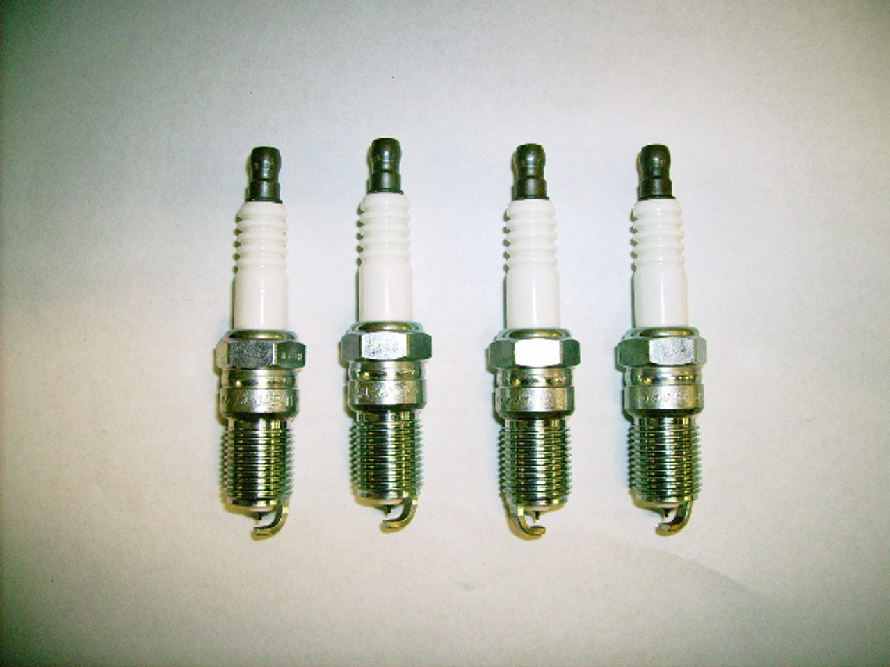 Mazda  Spark Plugs set of 4