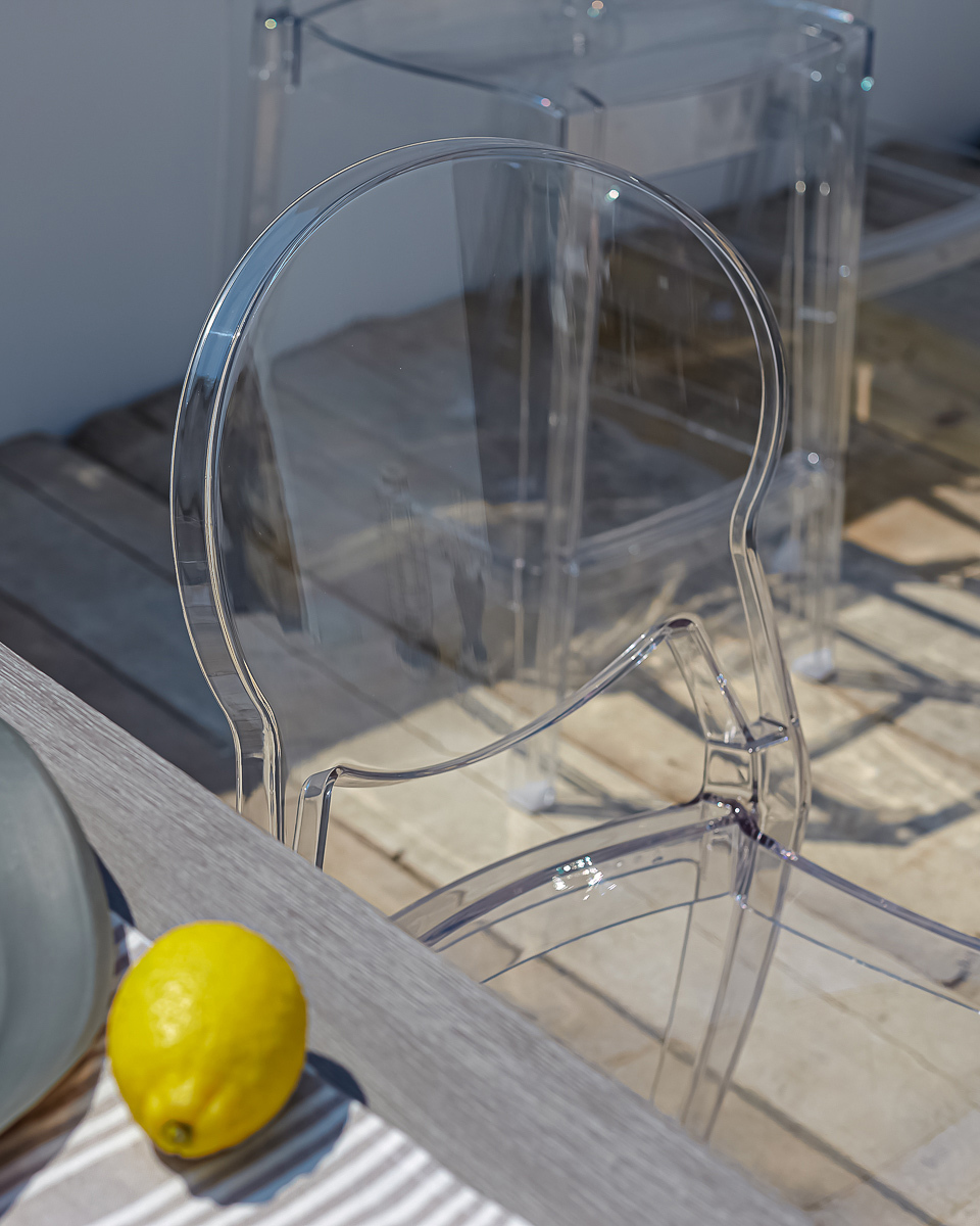 Clear chair in an outdoor setting