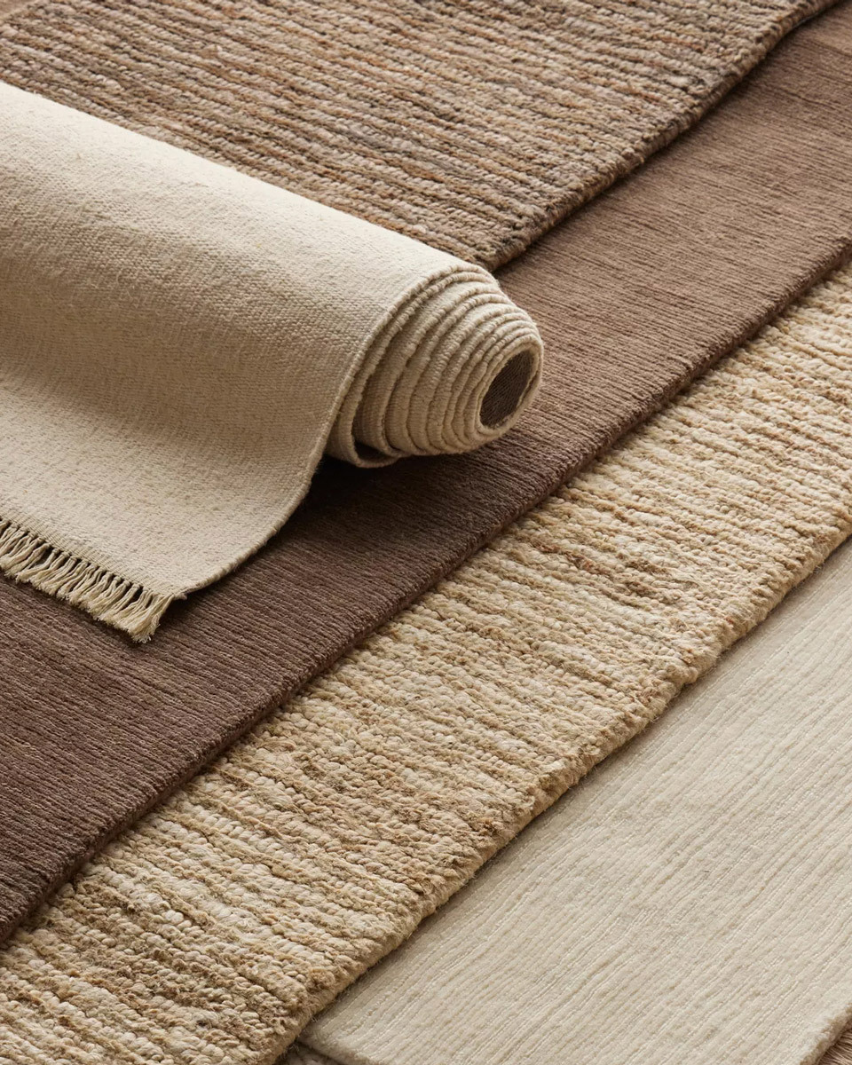 Birds eye view of different textured and coloured floor rugs