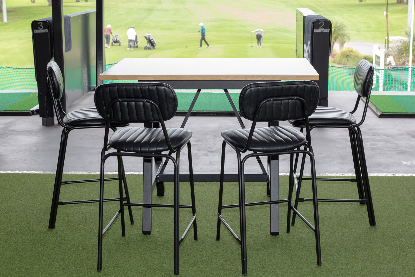 Driving Range Seating Area barry bar stools at Omanu Golf Club