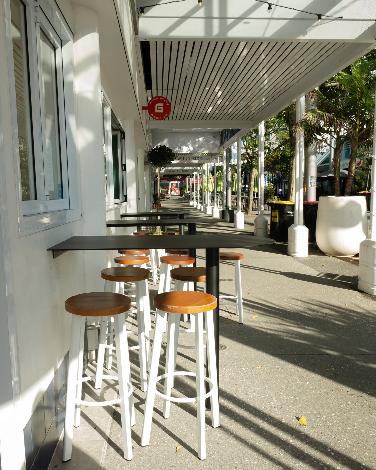 max stools and white bar leaners 