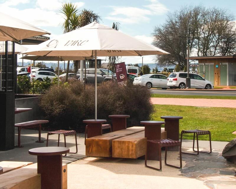 outdoor cafe seating with brick dining stools